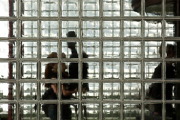 Image showing People in glass entrance