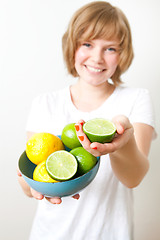 Image showing Woman with lemon and lime