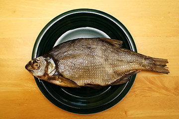 Image showing Foto of bream lying in black bowl