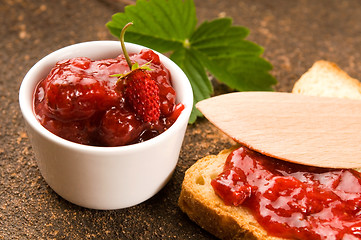 Image showing Wild strawberry jam with toast