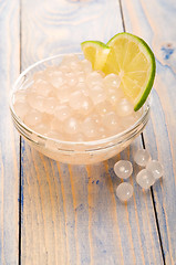 Image showing tapioca pearls with lime. white bubble tea ingredients