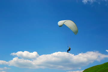 Image showing Paraglider on a cloud