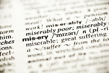 Image showing 'Misery' - dictionary definition vignette