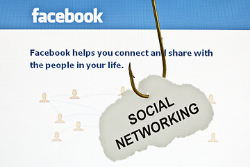 Image showing 'SOCIAL NETWORKING', infront of Facebook's main page