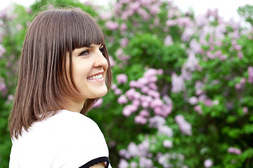 Image showing young woman in the lilac park