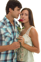 Image showing Man Woman holding single red rose