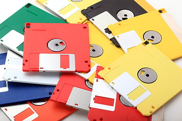 Image showing Many colored computer diskette isolated on white