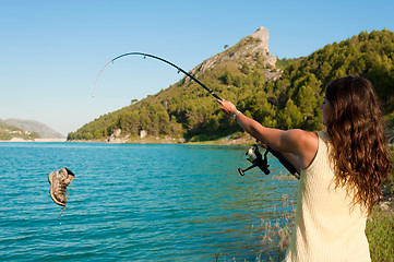 Image showing Fishing a boot