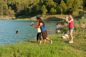 Image showing Fishing a boot