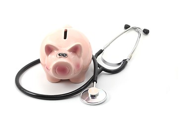 Image showing stethoscope and piggy bank