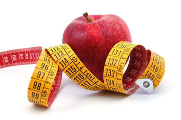 Image showing Apple and measuring tape on white