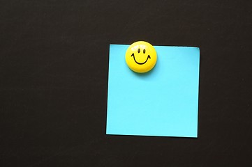 Image showing smiley and paper with copyspace