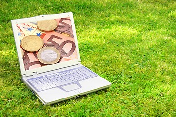 Image showing laptop and money