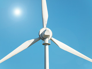 Image showing Wind turbine and sun