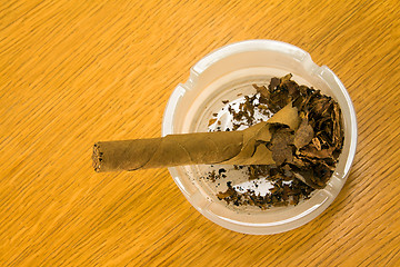 Image showing Cigar in an ashtray