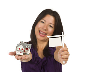 Image showing Multiethnic Woman Holding Small Blank Real Estate Sign and House