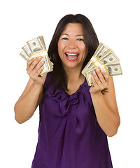 Image showing Excited Multiethnic Woman Holding Hundreds of Dollars