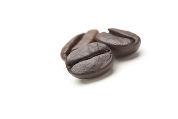 Image showing Three Roasted Coffee Beans on White