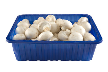 Image showing Fresh champignion mushrooms in blue box 