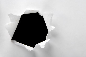 Image showing Hole in the white pape