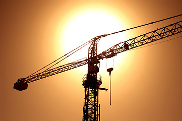 Image showing sunset with crane