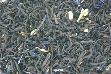 Image showing Black tea with petals