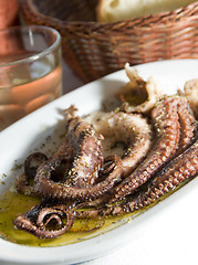 Image showing marinated octopus house wine crusty break Greece food