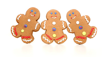 Image showing Happy Smiling Gingerbread Figures on White