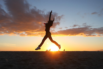 Image showing Beautiful Woman on the Beach at Sunset