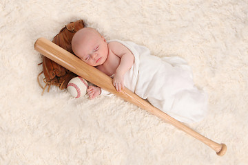 Image showing Swaddled Sleeping Baby Boy With a Baseball Bat