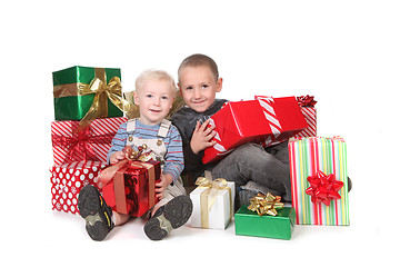 Image showing Kids Having a Good Christmas With Lots of Presents