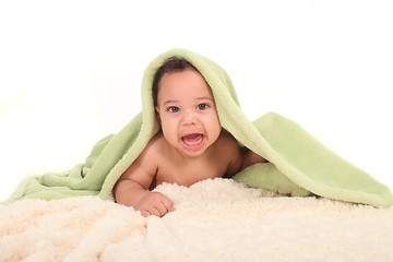 Image showing Excited Baby Boy With Blankets on a White Background