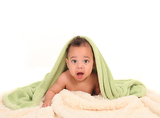 Image showing Adorable Baby With Blankets on White Background