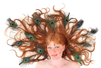 Image showing Red Head Woman With Peacock Feathers in Her Hair