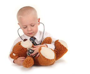 Image showing Doctor With Stethoscope and Teddy Bear as a Patient