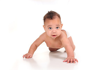 Image showing Infant Baby Boy Learning to Crawl on White