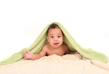 Image showing Infant Boy Lying on His Tummy Among Blankets