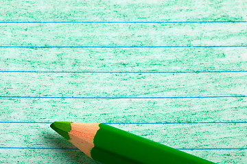 Image showing Green color pencil with coloring