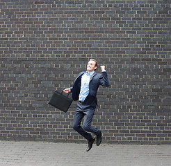 Image showing Business man jumping