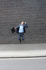 Image showing Business man jumping