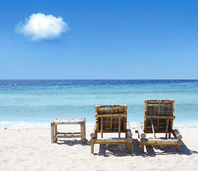 Image showing Beach chairs on beach