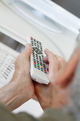 Image showing Senior man watching tv