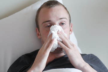 Image showing A man with the flu