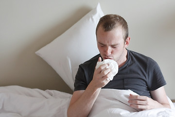 Image showing A man with the flu