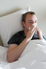 Image showing A man with the flu