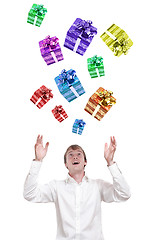 Image showing Happy guy with presents
