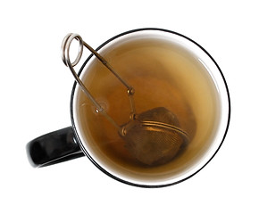 Image showing Brewing tea in a cup