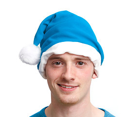 Image showing Guy with blue christmas hat