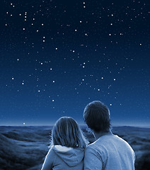 Image showing Couple under starry sky