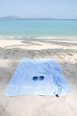 Image showing Sunglasses and towel